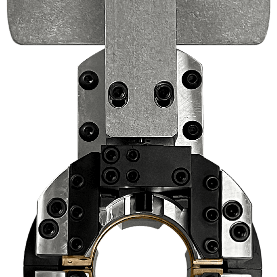 Metallic mechanical component with numerous screws.