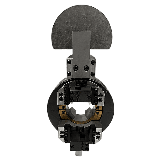 Industrial metal tool against black background.